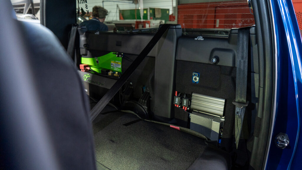 Redarc 40a BCDC Charger Behind Seat